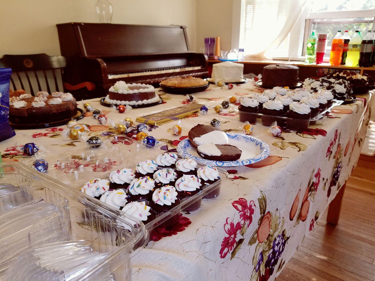 Dining room table set for Death By Chocolate Celebration.